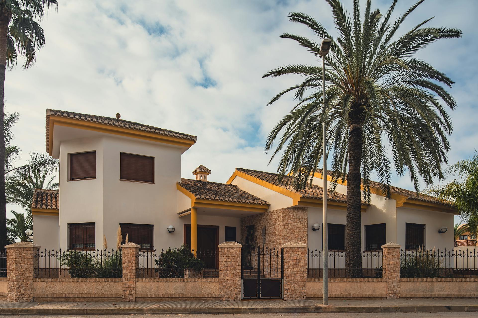 Mediterranean Revival barrel-tile reinstall in Coconut Grove
